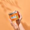 KUSMI21647A1070 3585810081571 04 lifestyle hand orange AI
