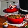Kastrol SIGNATURE 31 cm, 6,3 l, oválný, CERISE, litina, Le Creuset